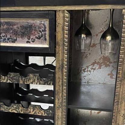 Close detail of the custom finish on a bar cabinet