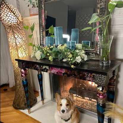 Decorated console and mirror with a colorful hand-finished design